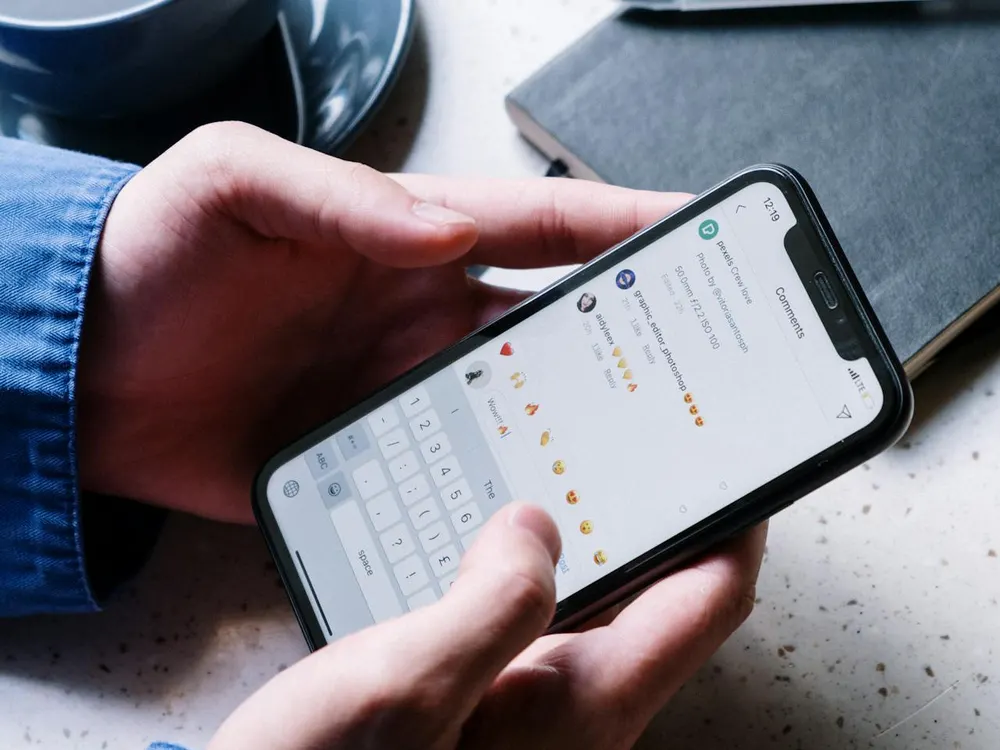Employee using a business phone app on a smartphone with the company caller ID