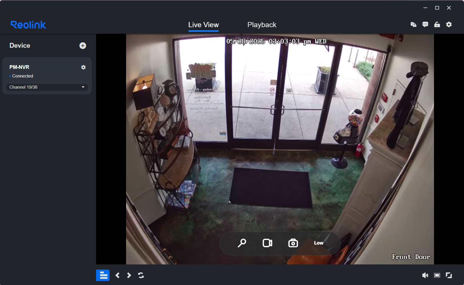 Screenshot: Live View: Click the camera thumbnails to view live footage. Multi-Camera View: Select multiple cameras to